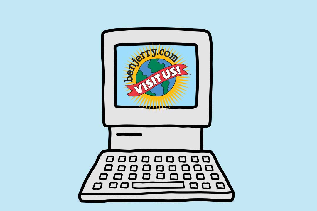 Computer med skærm, hvor der står “Besøg os”